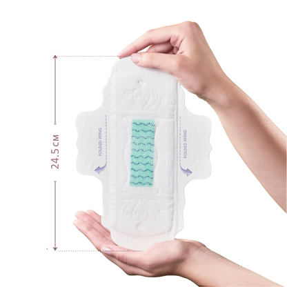 Pectiv The Day sanitary pad dimensions and ultra-thin profile with side wings for flexible daytime leak protection.